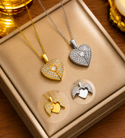 freakySera anti tarnish stainless steel jewellery collection with gold and silver heart pendants displayed on a beige jewellery box